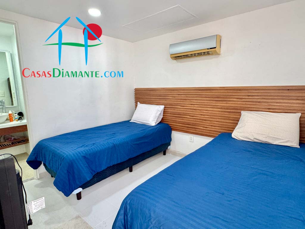 Brisas Diamante Suite 67 - Recámara uno 1